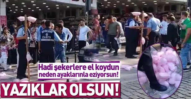 Zabıta el koyduğu pamuk şekerleri ezdi