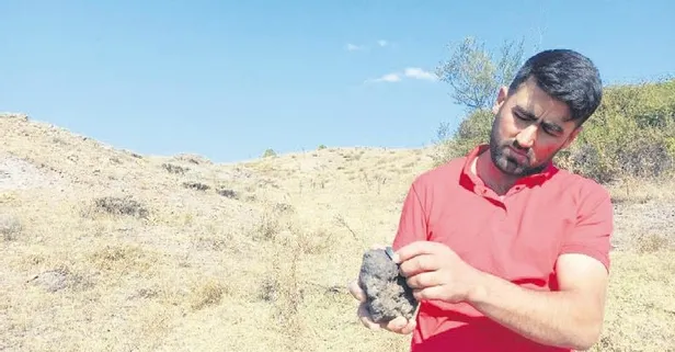 Hayvan otlatırken tesadüfen bulduğu 3 kiloluk taşın incelenmesini istiyor