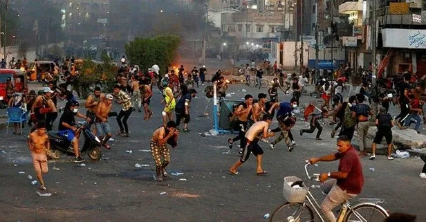 Irak'ın başkenti Bağdat'ta güvenlik güçleriyle göstericiler arasında arbede: 13 yaralı