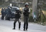 Son dakika: İsrail Batı Şeriada 12 Filistinliyi daha gözaltına aldı!