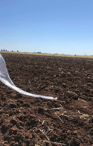 Şanlıurfa'da tarlaya düşen balondan uçaksavar mermisi çıktı