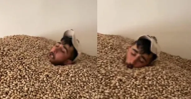 Siirt’te fıstık deposunda mide bulandıran görüntüler! Boynuna kadar fıstıkların içine girdi yetmedi tükürdü! Tepki çeken görüntüler sonrası 2 ton fıstığa el konuldu