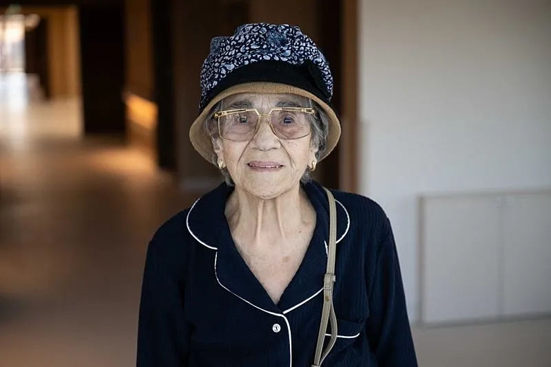 Başkan Erdoğan'ın Darülaceze ziyaretinde ʺKimsem yok.ʺ demesi üzerine ʺBiz varız.ʺ diyerek karşılık verdiği Suzan Tosun AA muhabirine konuştu. (AA)