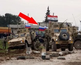 ABD ile Esad güçlerinin karşı karşıya geldiği bölgede Rus bayraklı araçlar dikkat çekti