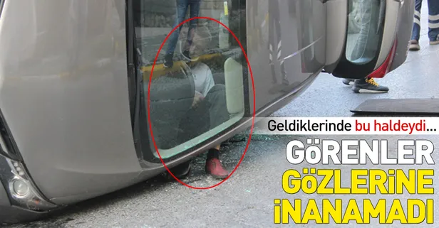 Takla atan araçta böyle sıkıştı
