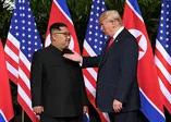 Trump ve Kim zirvesinden ilk görüntüler
