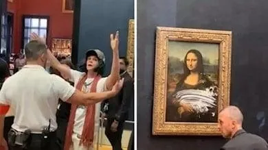 pariste-mona-lisa-tablosuna-pastali-saldiri-1653913593515.jpeg Paris'te Mona Lisa tablosuna pastalı saldırı!-3