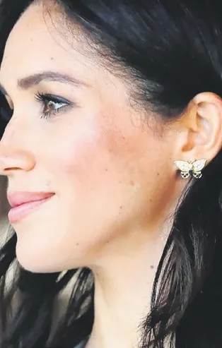 Meghan Markle'ın Prenses Diana'ya ait küpeleri takması dikkat çekti