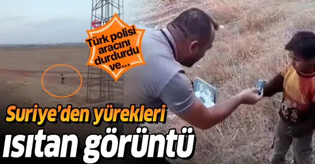 Polis, aracı durduran Suriyeli çocuğa çikolata verdi