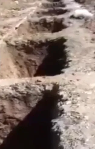 Görüntüler ortaya çıktı! İran'da koronavirüsü nedeniyle ölenler böyle gömülüyor