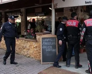 Fal bakan kafelere baskın