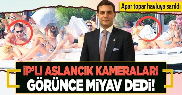 Bir sarışın bir esmerle Bodrum’da görüntülenen İYİ Partili Mehmet Aslan havluyla yüzünü gizledi