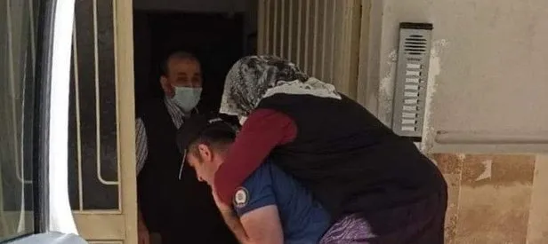 Polis ayağı kırılan kadını sırtında taşıdı