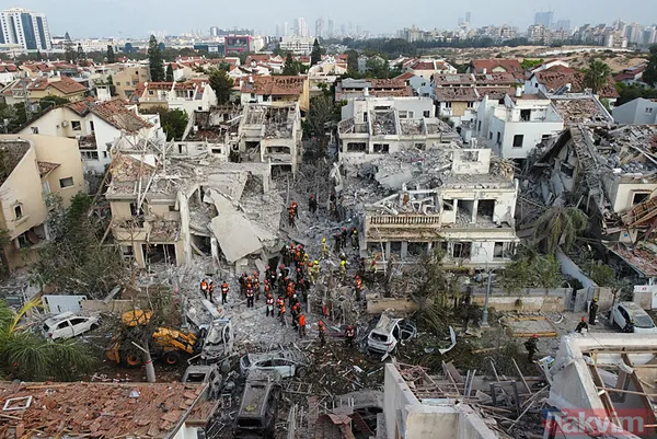 İran'dan İsrail'e misilleme! Füzeler yağdı binalar yıkıldı | İşte yıkımdan kareler - 37