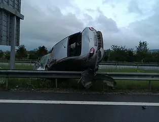 Kontrolden çıkan araç takla attı! Bariyerlerde asılı kaldı
