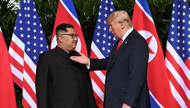 Trump ve Kim zirvesinden ilk görüntüler