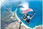 Ölüdeniz'de başına paraşütçü düştü