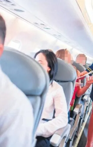 Hostes Y.Y uçakta servis yaparken eteğinin altından fotoğrafını çeken İsviçreli bankacı yakayı ele verdi