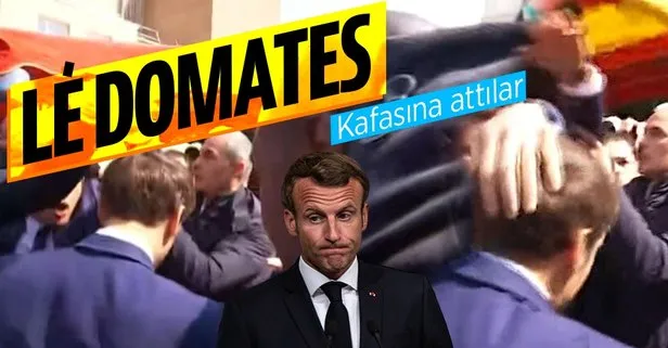 Macron’un kafasına zafer gezisinde domates attılar