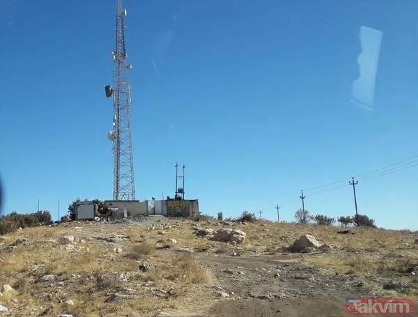 Terör örgütü PKK tarafından, Sincar Dağı'nın tepesinde iletişim direklerinin bulunduğu alana terör örgütü elebaşı ve teröristlerin posterlerinin asıldığı...