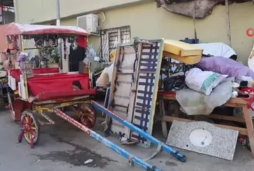 Mersin'de çöp evden tonlarca atık çıkarıldı