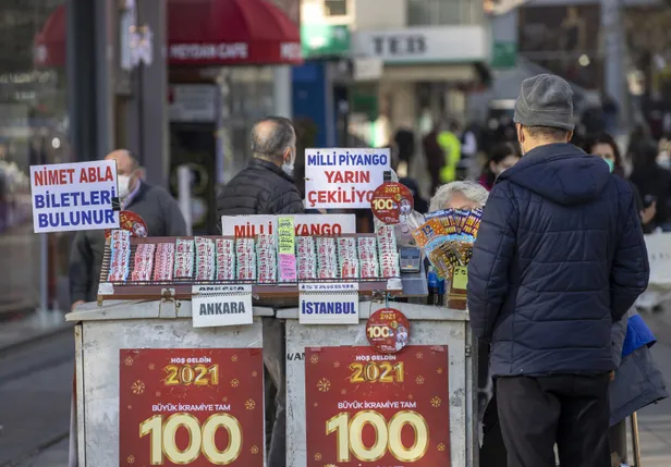 yilbasi-2021-milli-piyango-buyuk-ikramiye-kime-cikti-hangi-ilesehre-cikti-ceyrek-yarim-tam-hangi-bilete-cikti-1609443765729.jpg