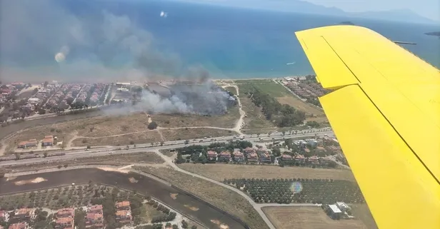 Son dakika: İzmir Seferihisar'da sazlık alanında çıkan yangın ekiplerin müdahalesi ile 1 saatte kontrol altına alındı