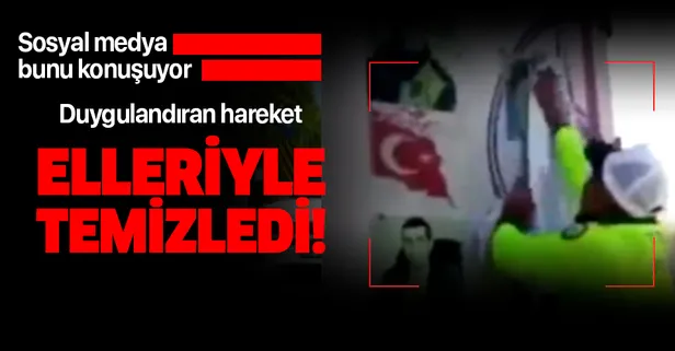 Son dakika: Sosyal medya bunu konuşuyor! Çevirme yapan trafik polisi şehit resimlerini elleriyle temizledi!