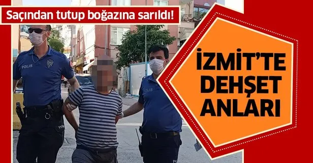 İzmit’te kendisini uyaran güvenlik görevlisi kadına darp: Saçından tutup boğazına sarıldı!