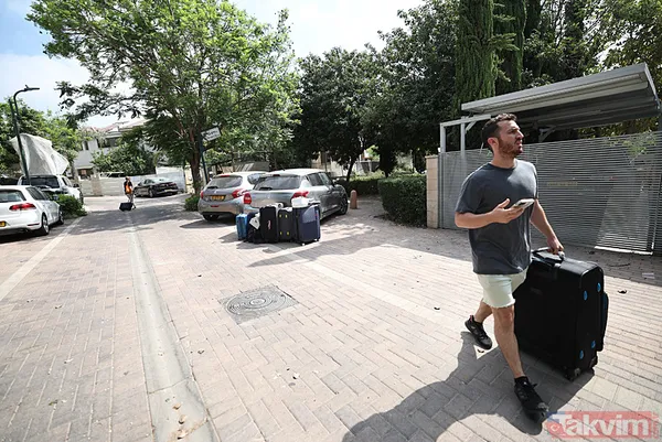 Siyonistler tası tarağı toplayıp kaçıyor! A Haber İsrail Tel Aviv'deki yıkımı görüntüledi... Binalar enkaza, araçlar hurda yığınına döndü - 20