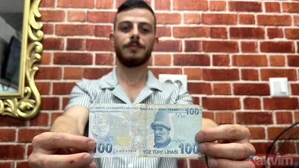 "PARANIN İKİYE KESİLDİĞİNİ FARK ETTİK" Dikkatli bakılmadığı zaman paranın gerçek mi sahte mi olduğunun fark edilmeyeceğini dile getiren Yiğit, "Paranın...