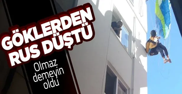 Antalya’da Rus kadın paraşütle çatıya düştü