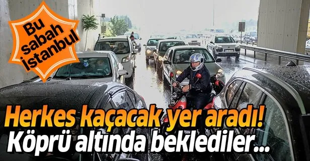 İstanbul’da dolu riskinden korunmaya çalışan araç sürücüleri üst geçit altlarına sığındı