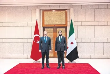 Dünyaya mesaj! Ahmed eş-Şera Türk heyetini kravatlı bir şekilde karşıladı